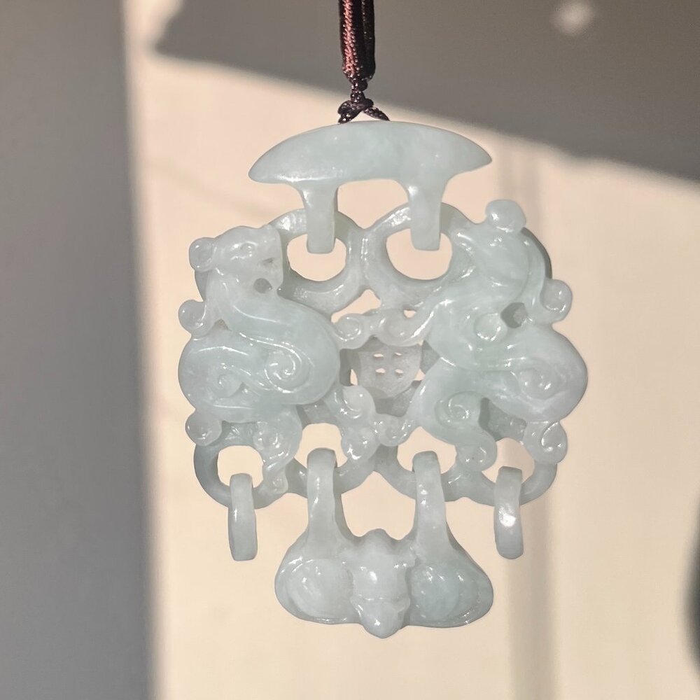 Light Green Jade Dragon & Phoenix Pendant – Double-Sided Openwork Carving